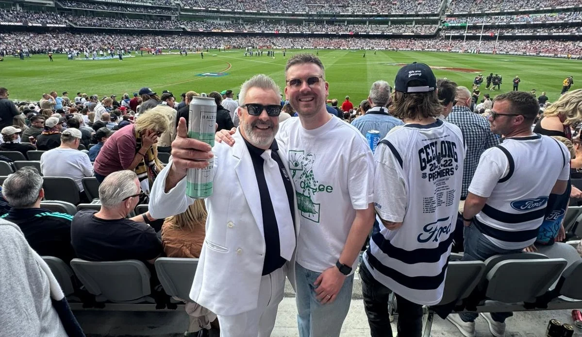 Taskforce Australia staff attending a Melbourne sporting event together as part of team social activities